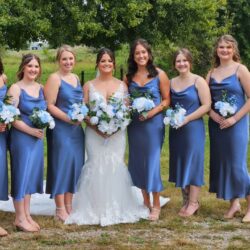 Taylor and Logan's charming blue watercolor-themed wedding at the Amana Colonies in Iowa