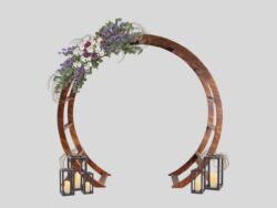 Wedding reception with fairy lights and purple floral decor at Prairie Oak Lodge Marion Iowa
