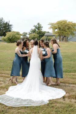 Charming wedding details with cheerful blue accents at the Amana Colonies in Iowa