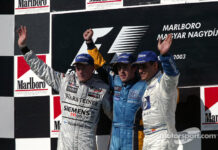 Podio: ganador de la carrera de Fernando Alonso con Kimi Raikkonen y Juan Pablo Montoya