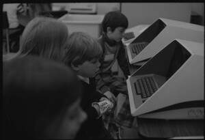 Children working on VT105 and LA30