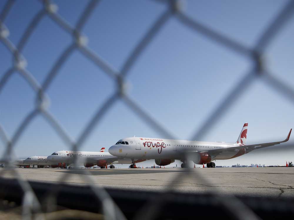 Canadian airlines wait for federal aid package to help travel industry survive COVID-19