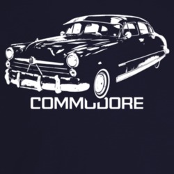 1950 Commodore Three Quarter Angle View With Model Name Dark Color T S