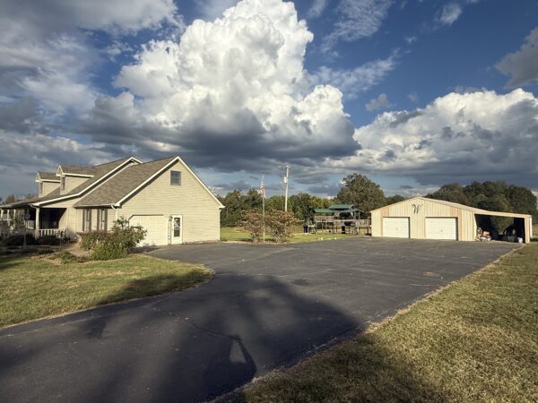 BEAUTIFUL HOME, SHOP & 48+/- ACRES
