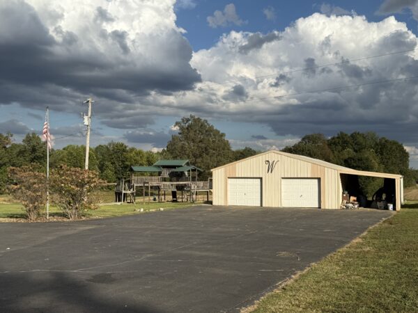 BEAUTIFUL HOME, SHOP & 48+/- ACRES