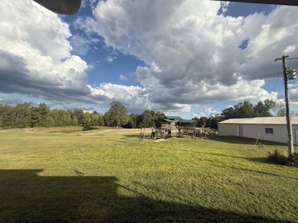 BEAUTIFUL HOME, SHOP & 48+/- ACRES