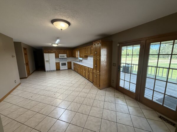 BEAUTIFUL HOME, SHOP & 48+/- ACRES