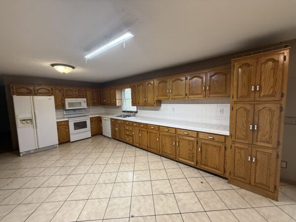 BEAUTIFUL HOME, SHOP & 48+/- ACRES