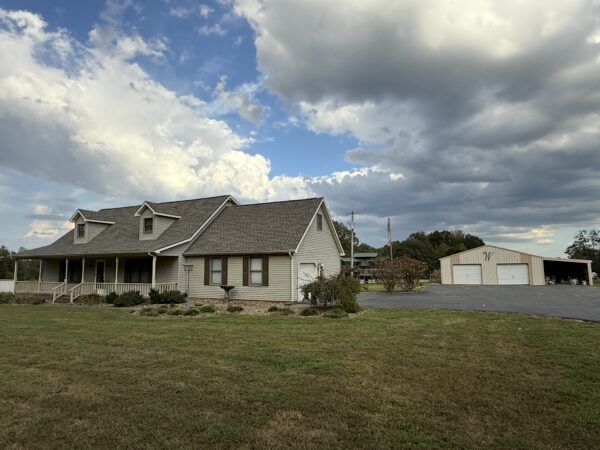 BEAUTIFUL HOME, SHOP & 48+/- ACRES
