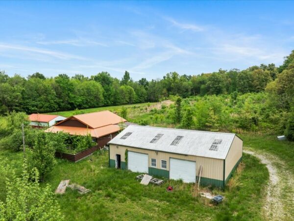 20.42 ACRES with NICE HOME, BARNS & POLE BARN HOME