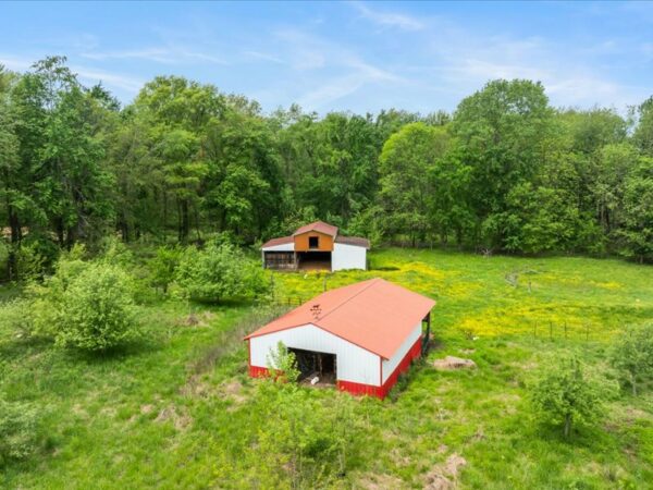 20.42 ACRES with NICE HOME, BARNS & POLE BARN HOME