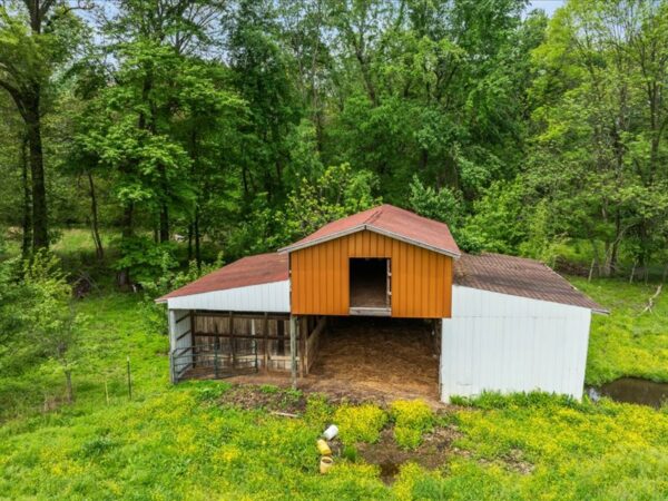20.42 ACRES with NICE HOME, BARNS & POLE BARN HOME