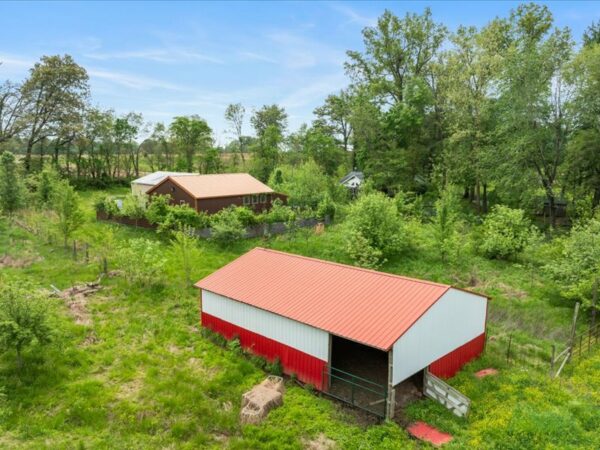 20.42 ACRES with NICE HOME, BARNS & POLE BARN HOME
