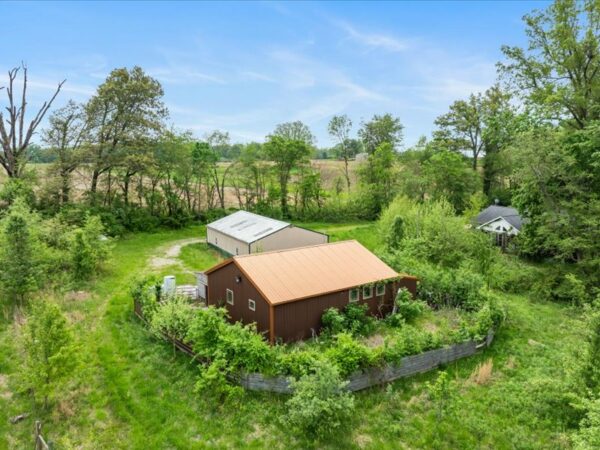 20.42 ACRES with NICE HOME, BARNS & POLE BARN HOME