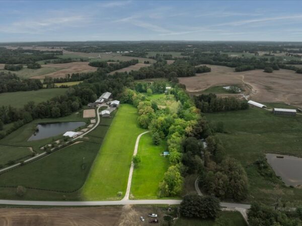 20.42 ACRES with NICE HOME, BARNS & POLE BARN HOME
