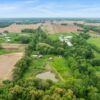 20.42 ACRES with NICE HOME, BARNS & POLE BARN HOME