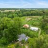 20.42 ACRES with NICE HOME, BARNS & POLE BARN HOME