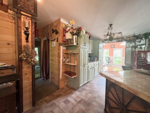 20.42 ACRES with NICE HOME, BARNS & POLE BARN HOME