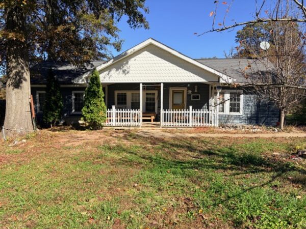 20.42 ACRES with NICE HOME, BARNS & POLE BARN HOME