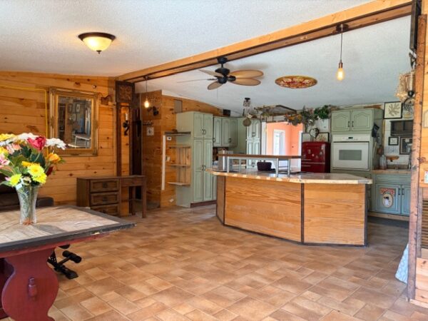 20.42 ACRES with NICE HOME, BARNS & POLE BARN HOME