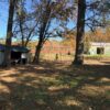 20.42 ACRES with NICE HOME, BARNS & POLE BARN HOME