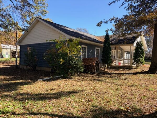 20.42 ACRES with NICE HOME, BARNS & POLE BARN HOME