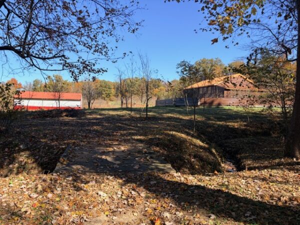 20.42 ACRES with NICE HOME, BARNS & POLE BARN HOME