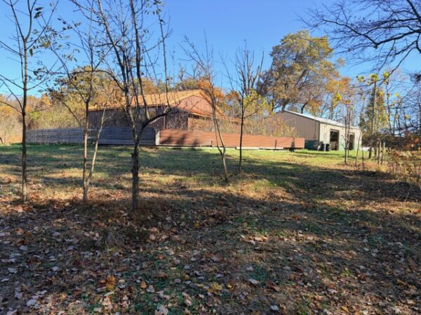 20.42 ACRES with NICE HOME, BARNS & POLE BARN HOME