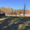 20.42 ACRES with NICE HOME, BARNS & POLE BARN HOME