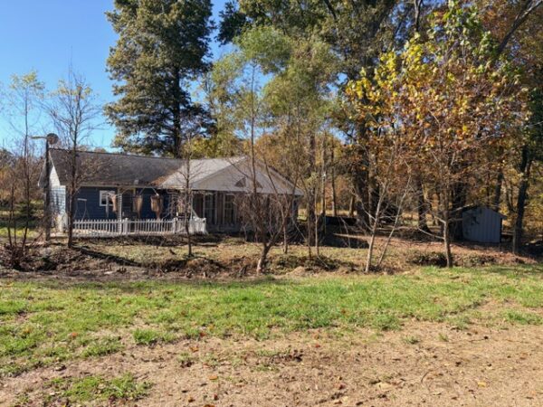 20.42 ACRES with NICE HOME, BARNS & POLE BARN HOME