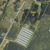 Screenshot 170+/- ACRES-50 POULTRY HOUSES-5 HOMES-OFFERED IN 9 TRACTS