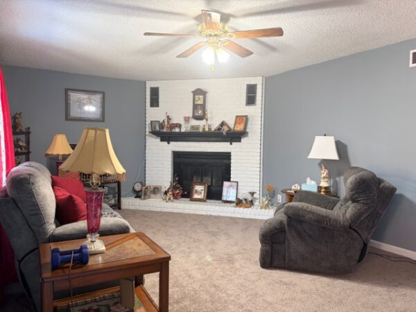 BEAUTIFUL BRICK HOME ON .81+/- ACRE LOT