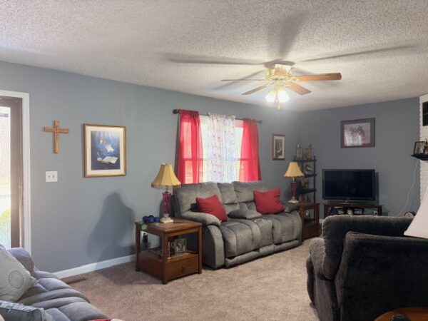 BEAUTIFUL BRICK HOME ON .81+/- ACRE LOT