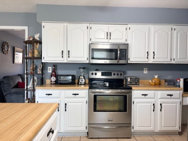 BEAUTIFUL BRICK HOME ON .81+/- ACRE LOT