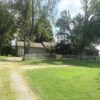 PRIVATE COUNTRY HOME ON 1.11+/- ACRE LOT
