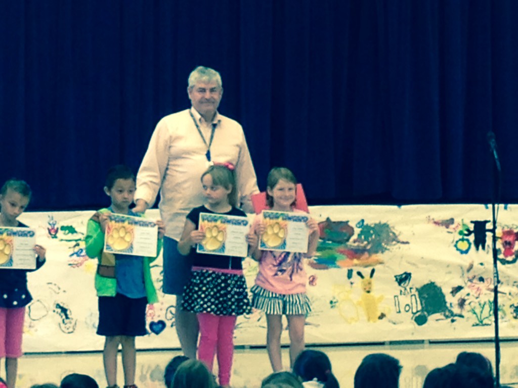 Lucy earned a PAW award at school. Funny that the reason for the award said "Conscious," no doubt intending to spell it "Conscientious." She was so happy. Since I ride the kids to school, and the assembly was in the morning, I got to be the attending parent. It felt pretty cool to be there for her.