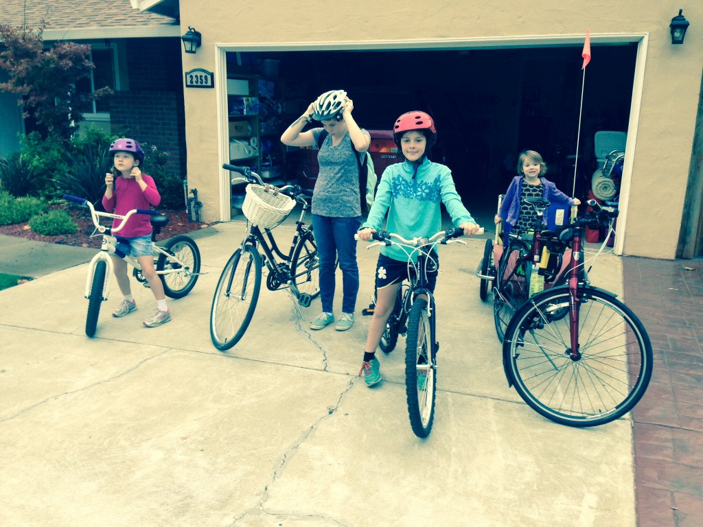 We ride to school pretty regularly, so this is what it looks like at about 7:45am. Avery likes to ride alone, though, and when I said, Okay, let's roll on out, she sighed and waited for us to leave before rolling out herself.