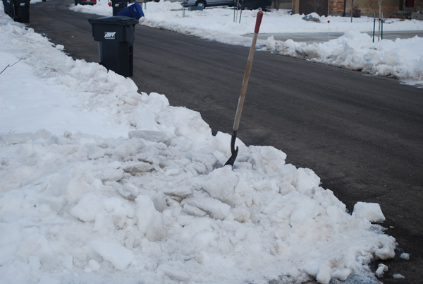 Chipping away at a glacier that covers my driveway