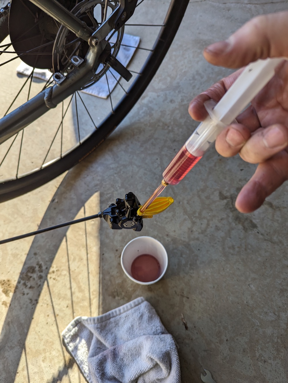Using the correct syringe technique to bleed my brakes