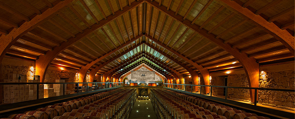 In the wine cellar, part of Christopher Columbus’s ship has been repurposed as the ceiling.