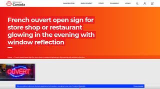 French ouvert open sign for store shop or restaurant glowing in the ...