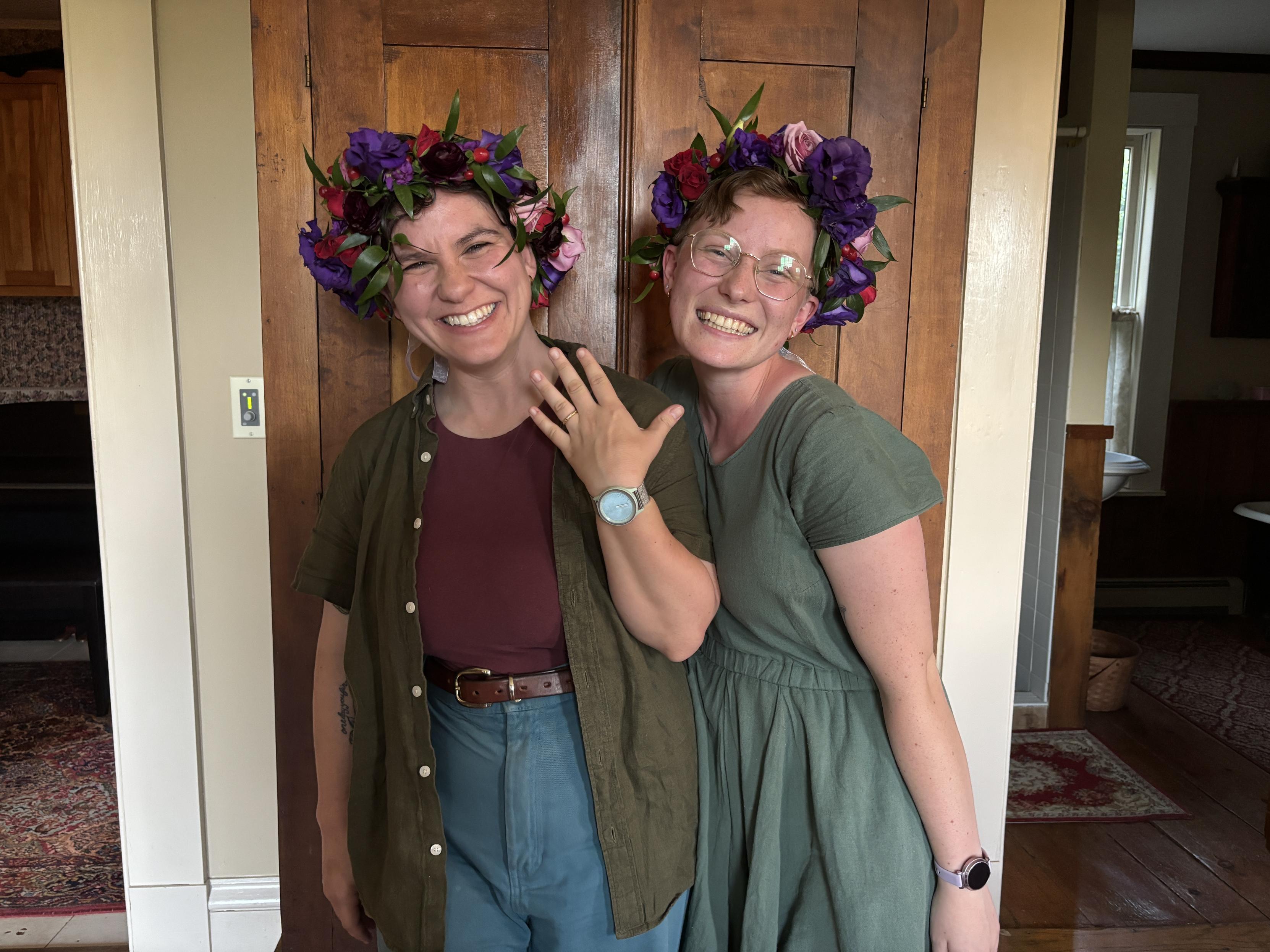 Two lesbians with huge grins