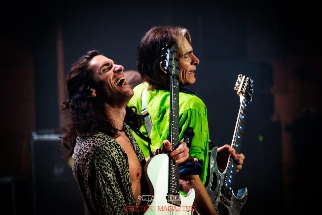 Dante performing with Steve Vai, photo courtesy of Dante Frisiello