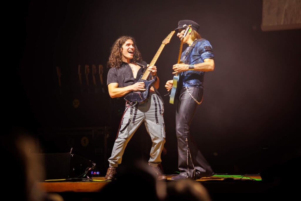 Dante performs with Steve Vai, photo courtesy of Dante Frisiello