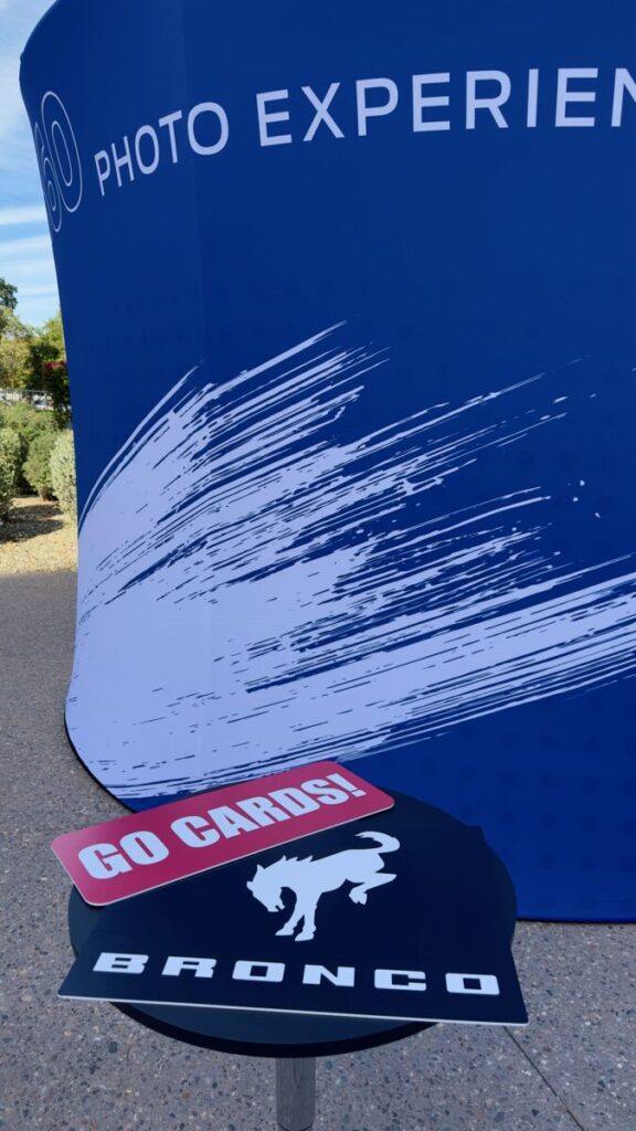 A branded 360 photo experience backdrop built for Ford at an Arizona Cardinals game