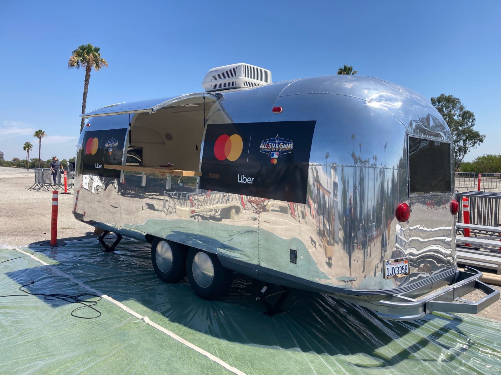 Polished Airstream snack bar branded for Mastercard and Uber at the MLB All-Star Game in Los Angeles