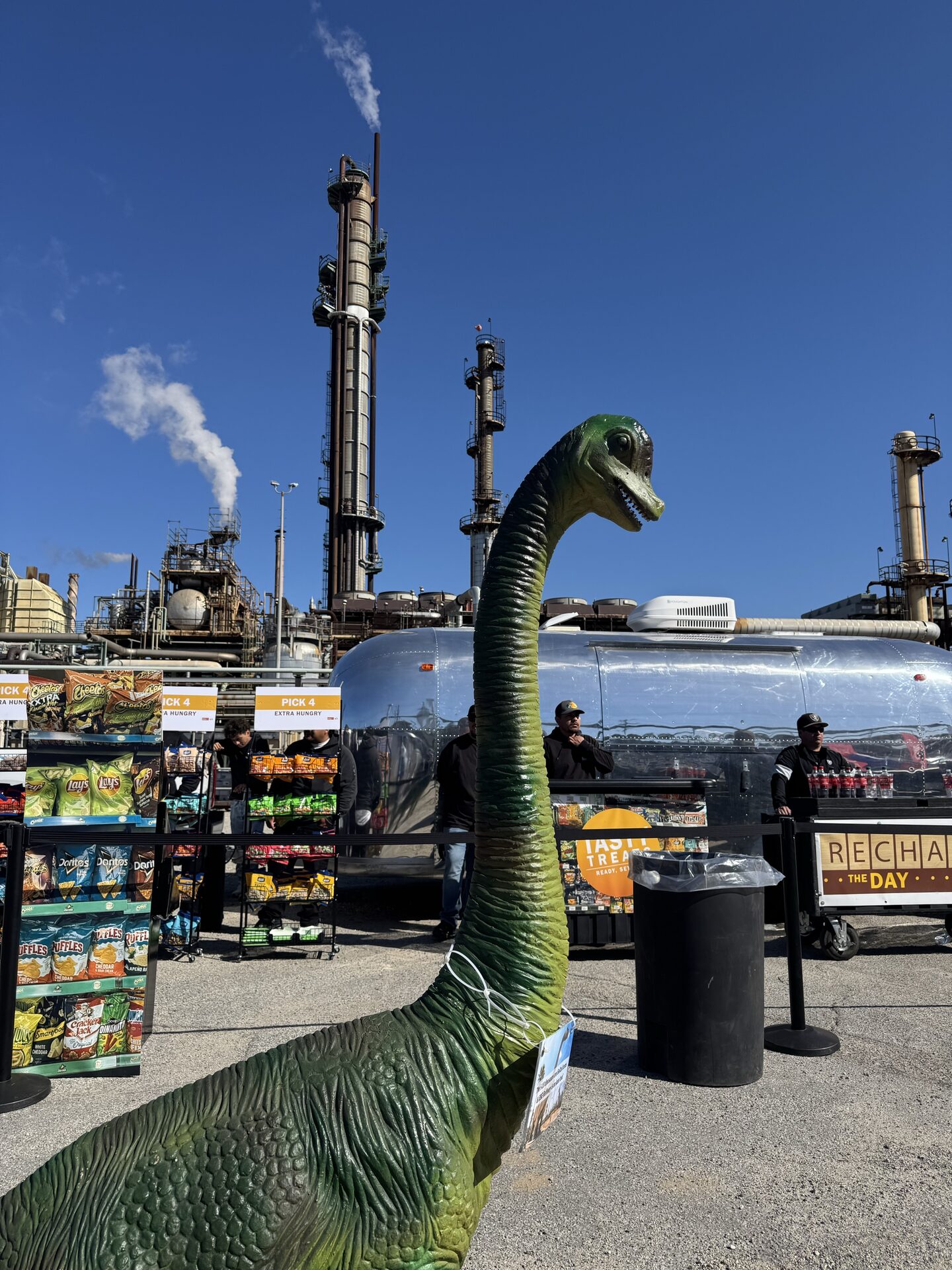 Green dinosaur statue in front of the Airstream snack bar at the Chevron El Segundo Refinery