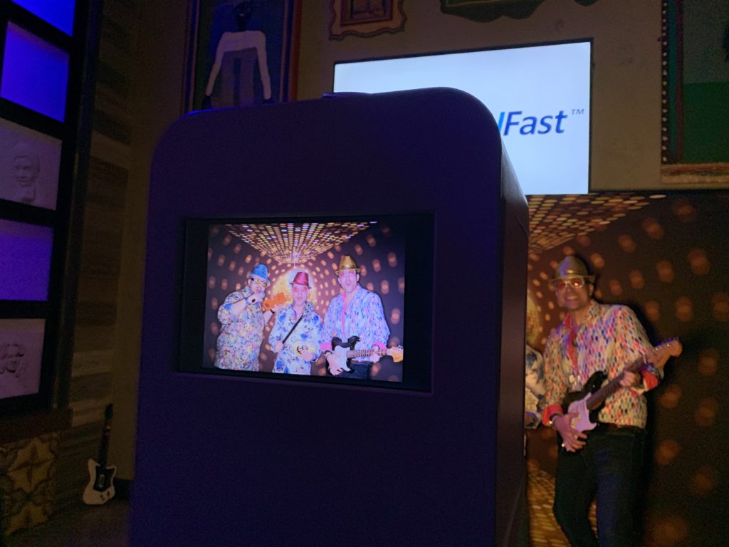 Photo booth kiosk showing a group photo at a corporate party at the House of Blues in Anaheim