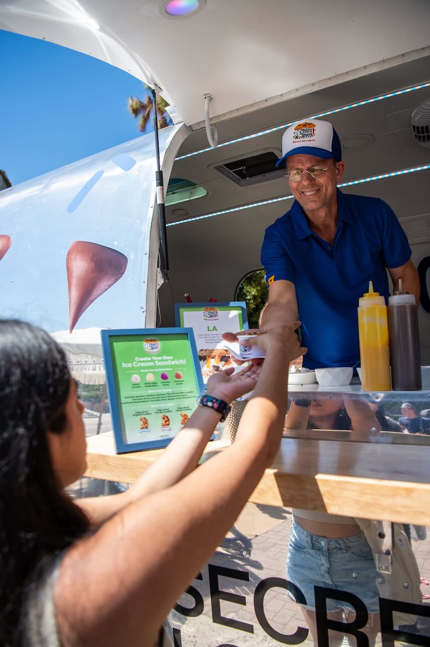 Sweet Handoff at the Airstream Window