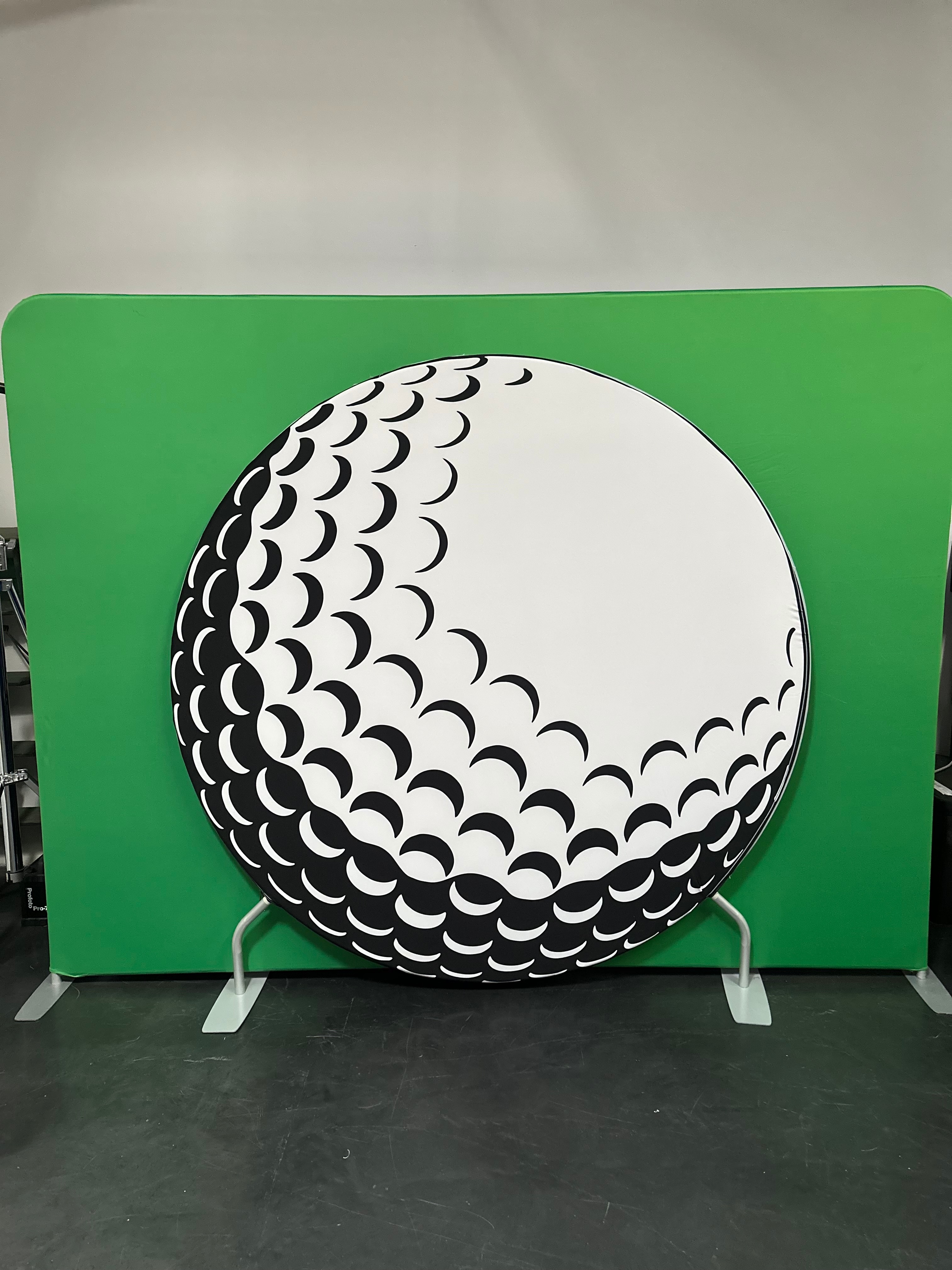 Giant golf ball themed circle backdrop